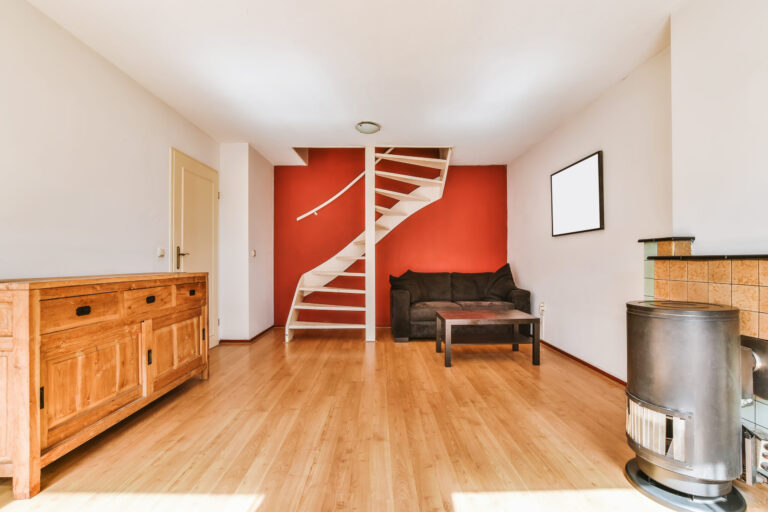 Luxurious interior design with modern spiral staircase and comfortable living room furniture