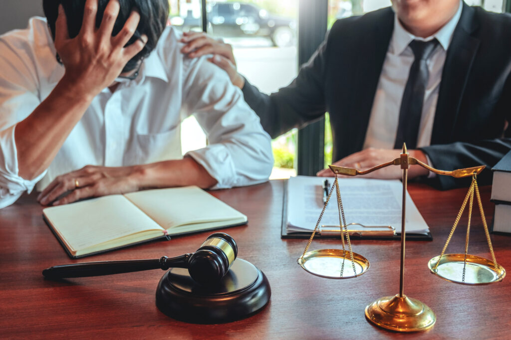 Lawyer shaking hands with client, legal representation and support for domestic violence victims
