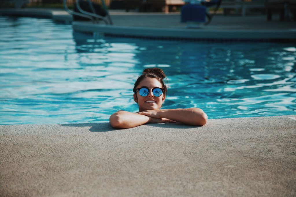 a person swimming in a pool
