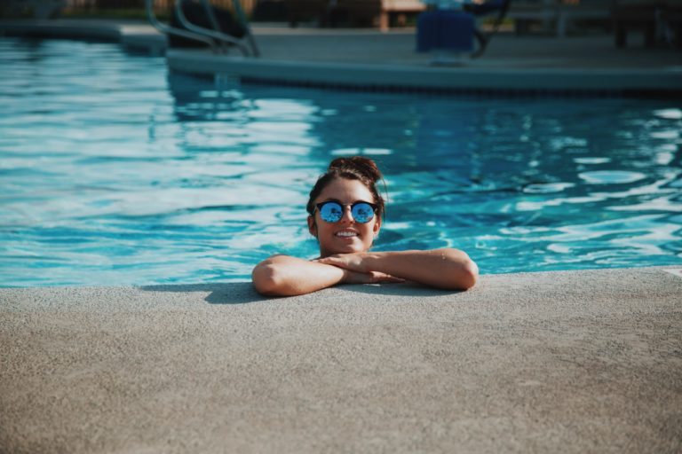 a person swimming in a pool